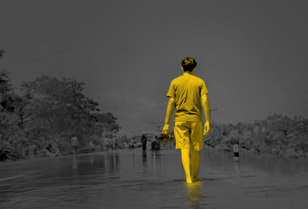 Person walking in flooded area