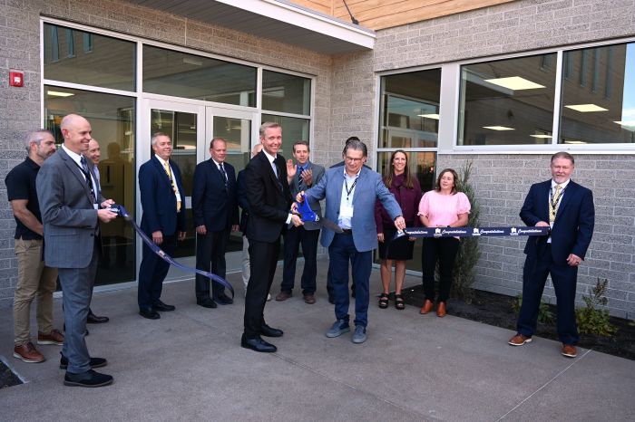 ribbon-cutting ceremony for buildinge expansion