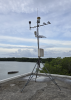The automated weather station bolted to the roof of the Glistening Waters Hotel<br /><br />(Photo courtesy of Dr. Ashley Matheny, University of Texas)