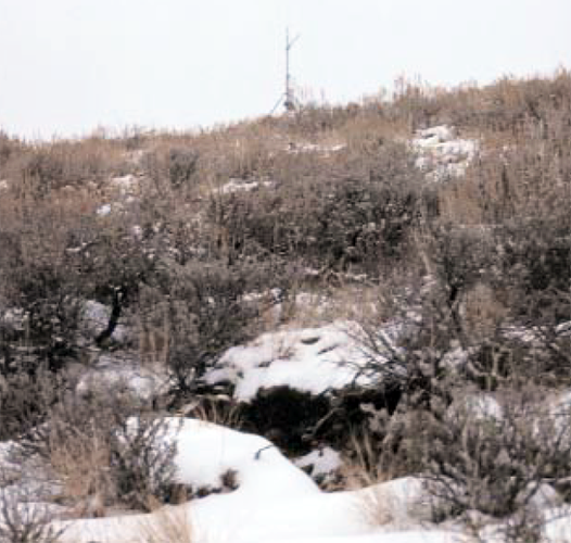 View upslope across fissure system (foreground) to measurement station